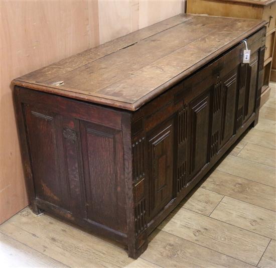 A 17th century and later inlaid oak coffer W.149cm